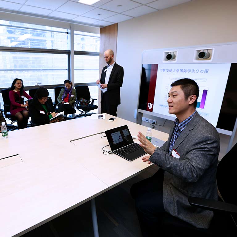 A speaker makes a presentation