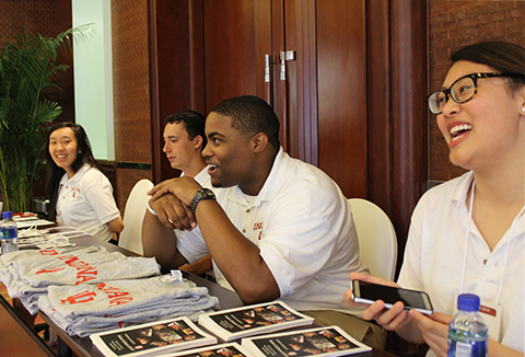 Students sitting at a conference table.