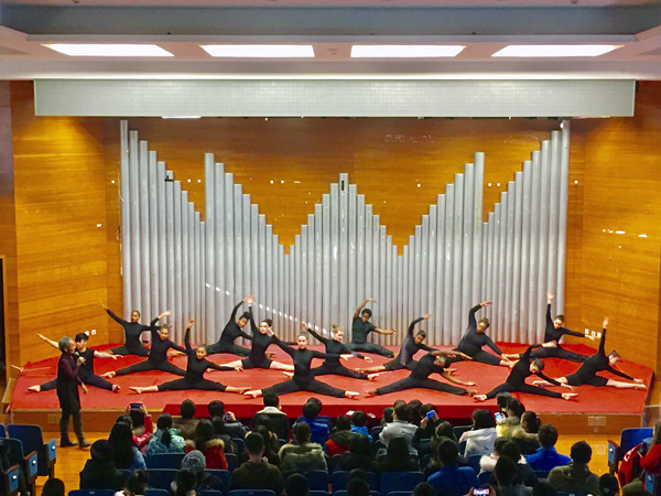IU African American dance troupe dancing on stage.