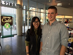 Michael Buening standing with his research partner Wanyi Huang.
