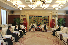 SPH faculty sitting in an opulent room.