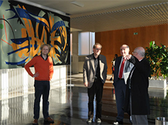 People standing in lobby of the Berlin art museum.