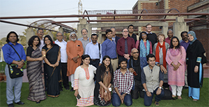Group of students standing on a rooftop.